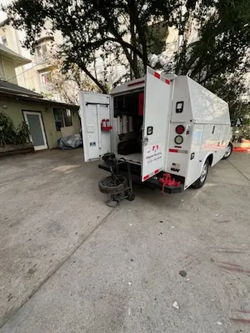 Magnet Plumbing service vehicle on-site for Water Heater Repair in Cushing Square