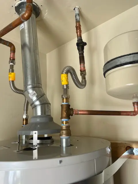 Water heater installation and plumbing repair in Cushing Square